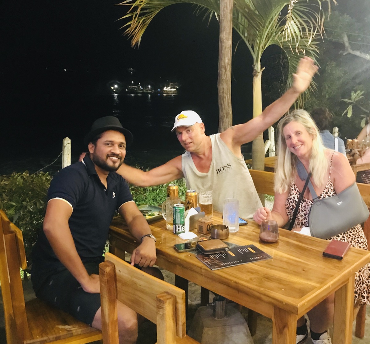 Nishan enjoying an evening meal with travellers